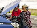 Women calling for assistance with broken car