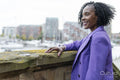 Thoughtful woman looking at city view