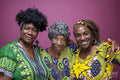 Studio portrait of senior woman with mature daughters