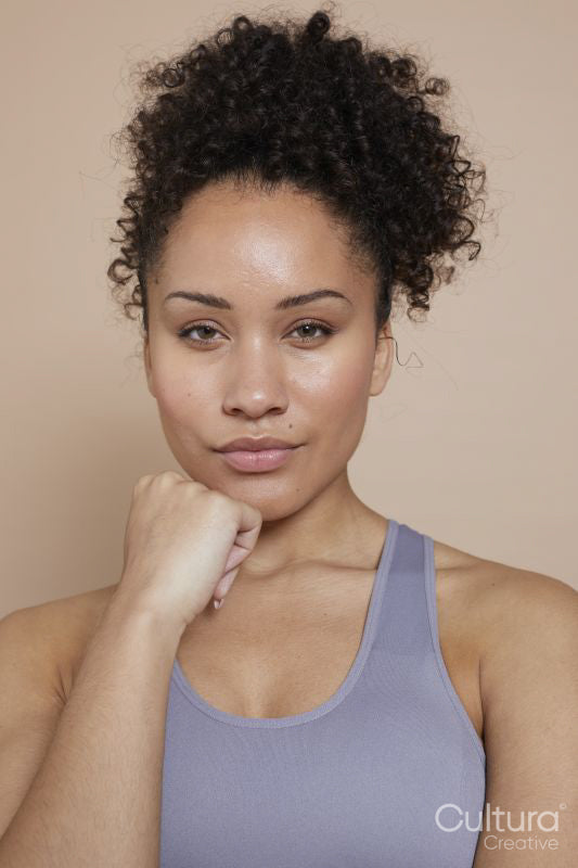 Studio portrait of athletic woman