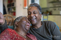 Senior couple laughing at home