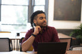 Businessman working on laptop in office