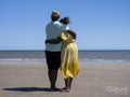 Mature couple hugging on beach