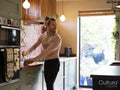 Man preparing baby milk at home kitchen
