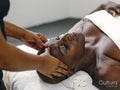 Mature woman having head massage