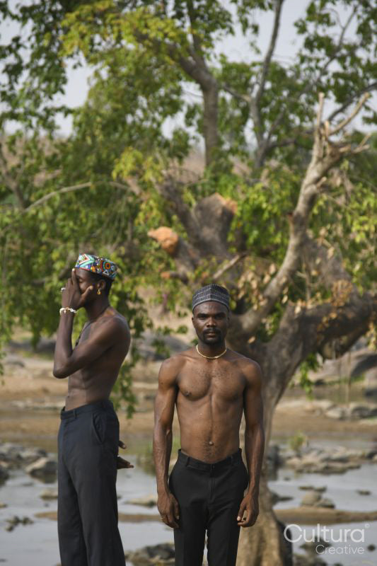 Portrait of two young shirtless men