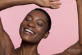 Smiling young woman dancing
