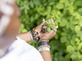 Woman holding seedling in allotment