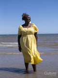 Mature woman standing on beach