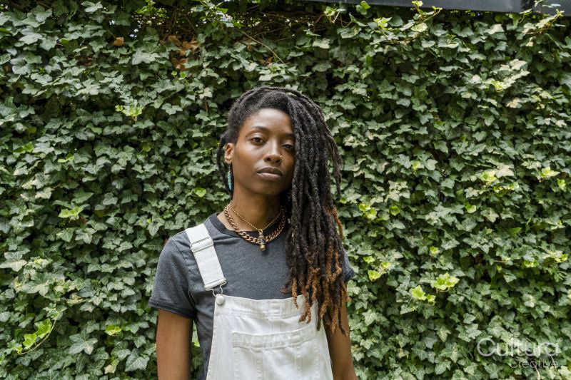 Portrait of stylish young woman outdoors