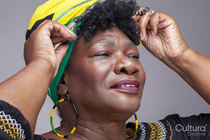Studio shot of mature woman wearing a headscarf