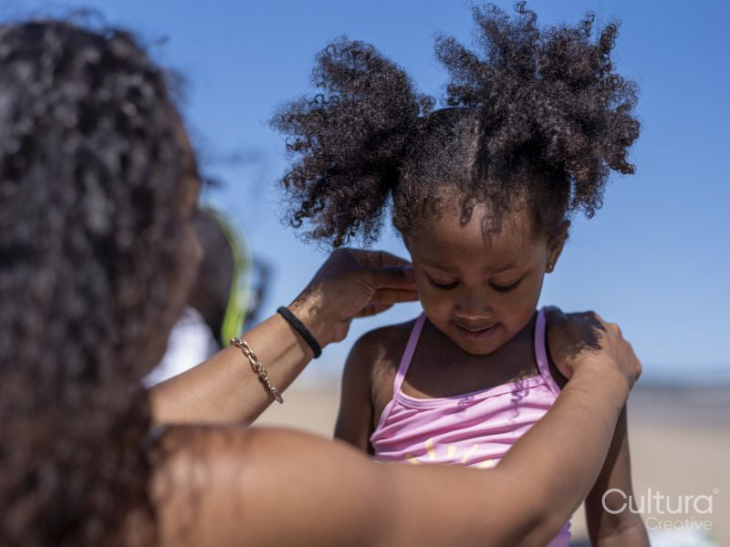 Mother and daughter on beach