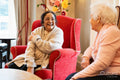 Cheerful senior women talking together