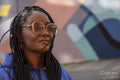 South Yorkshire, Portrait of smiling woman with braided hair
