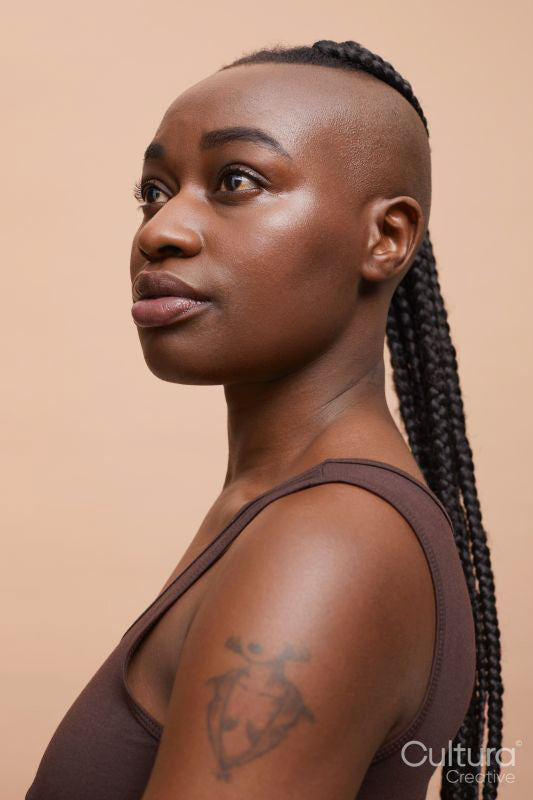 Portrait of beautiful woman with mohawk hair