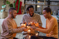 Friends untangling string light