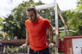 Brazil, Sao Paulo, Man in sports clothing exercising in park