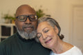 Portrait of senior couple with eyes closed