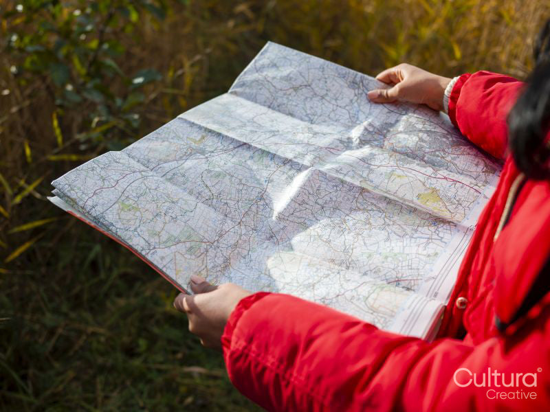 Female hiker using map
