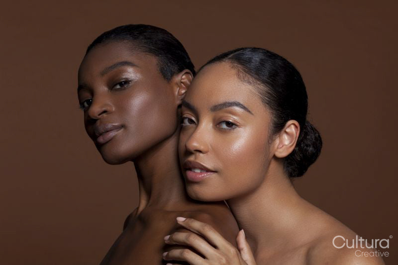 Portrait of young women embracing
