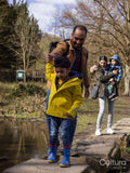 Parents with two sons in park