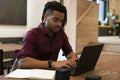 Businessman working on laptop in office