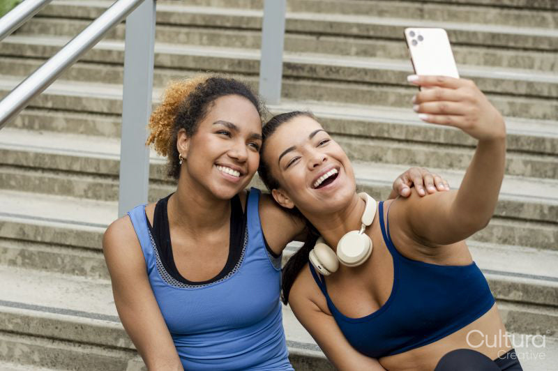 Female friends taking selfie