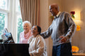 Senior people singing at piano in nursing home