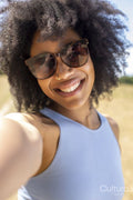 Portrait of young woman wearing sunglasses