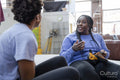 Mother and daughter talking while preparing for climbing