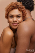 Studio portrait of hugging couple