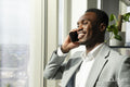 Young businessman using smart phone