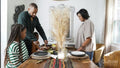 Family with children having Kwanzaa meal