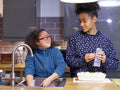 Sisters in kitchen