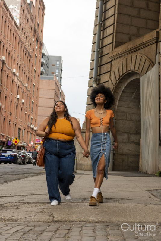 Two young women in street