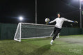 Young women playing soccer
