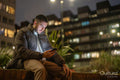 Young man using smart phone outdoors