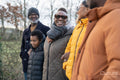 Three generation family walking together in rural area