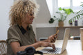 Smiling businesswoman working in office
