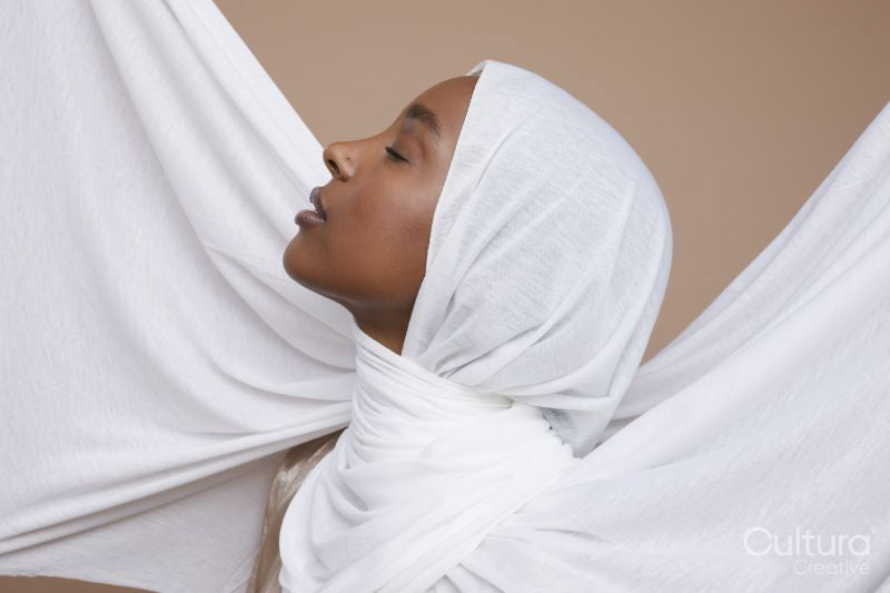 Studio shot of young woman in white hijab