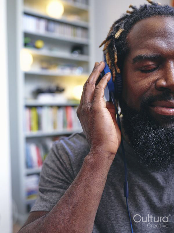 Man listening to music on headphones
