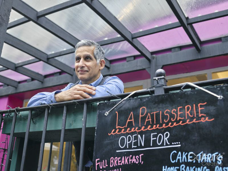 Portrait of cafe owner on terrace
