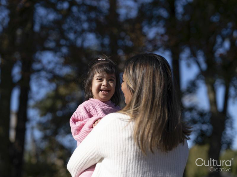 Mother hugging daughter with Down syndrome