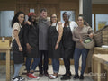 Portrait of volunteers working in community food center