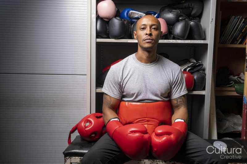 Portrait of mature man in boxing gloves