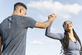 Couple of athletes doing high five