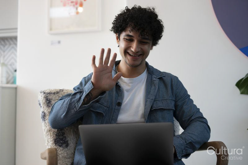 Man working on laptop in office