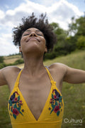 Young woman relaxing in meadow