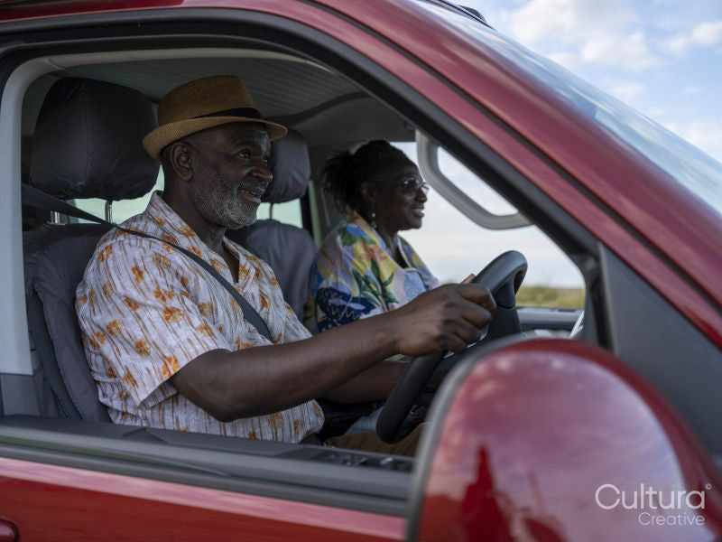 Senior couple traveling in van