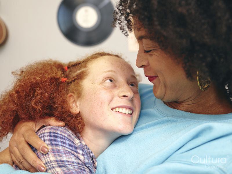 Mother and daughter embracing